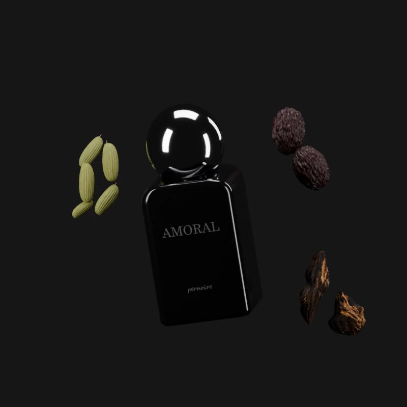 AMORAL perfume bottle with cardamom pods, smoked prunes and oud wood.