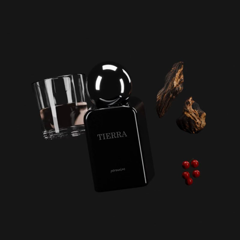TIERRA-Flakon mit einem Glas Rum, roten Beeren und Oudholz.